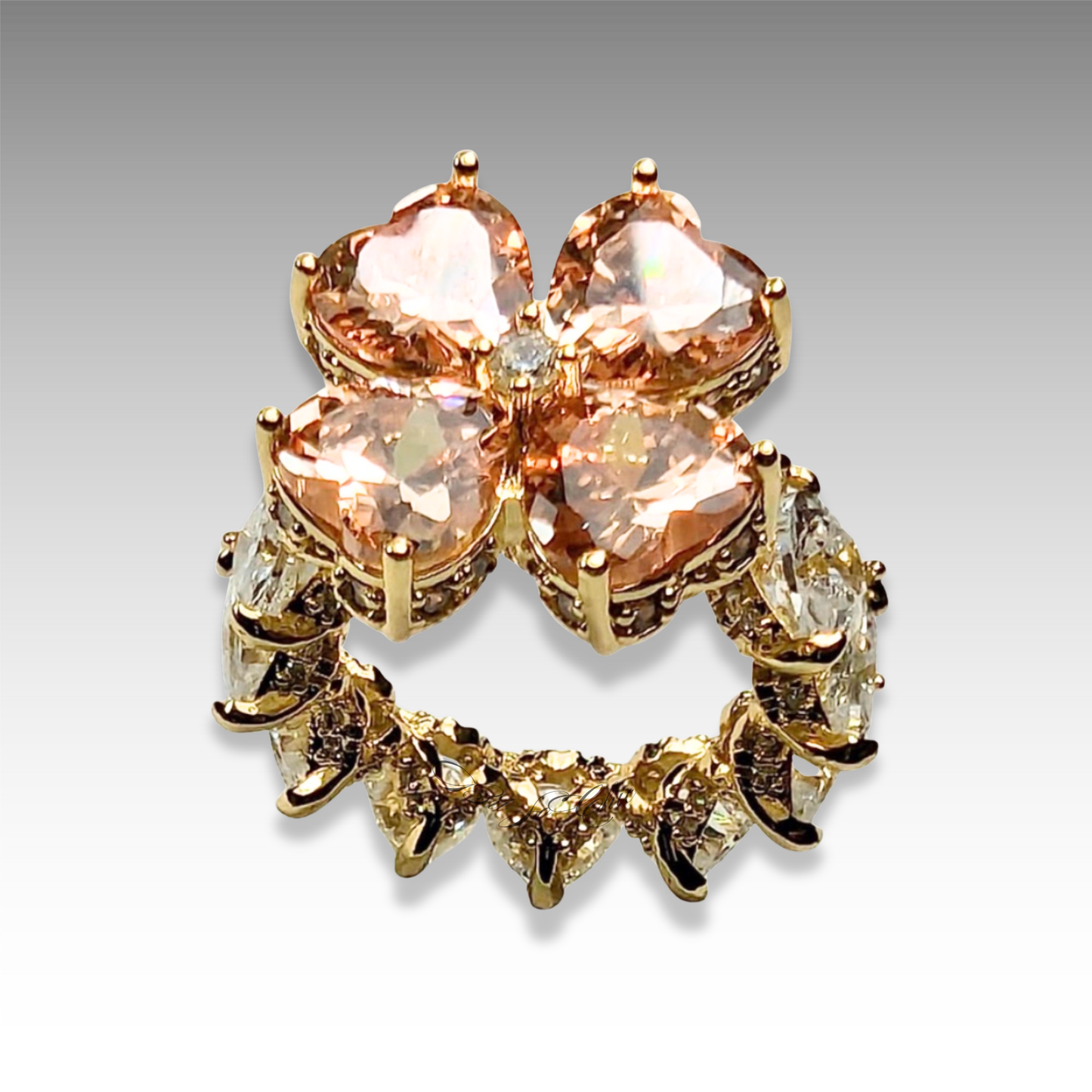Brown Clover ring with white gemstones and gold tone