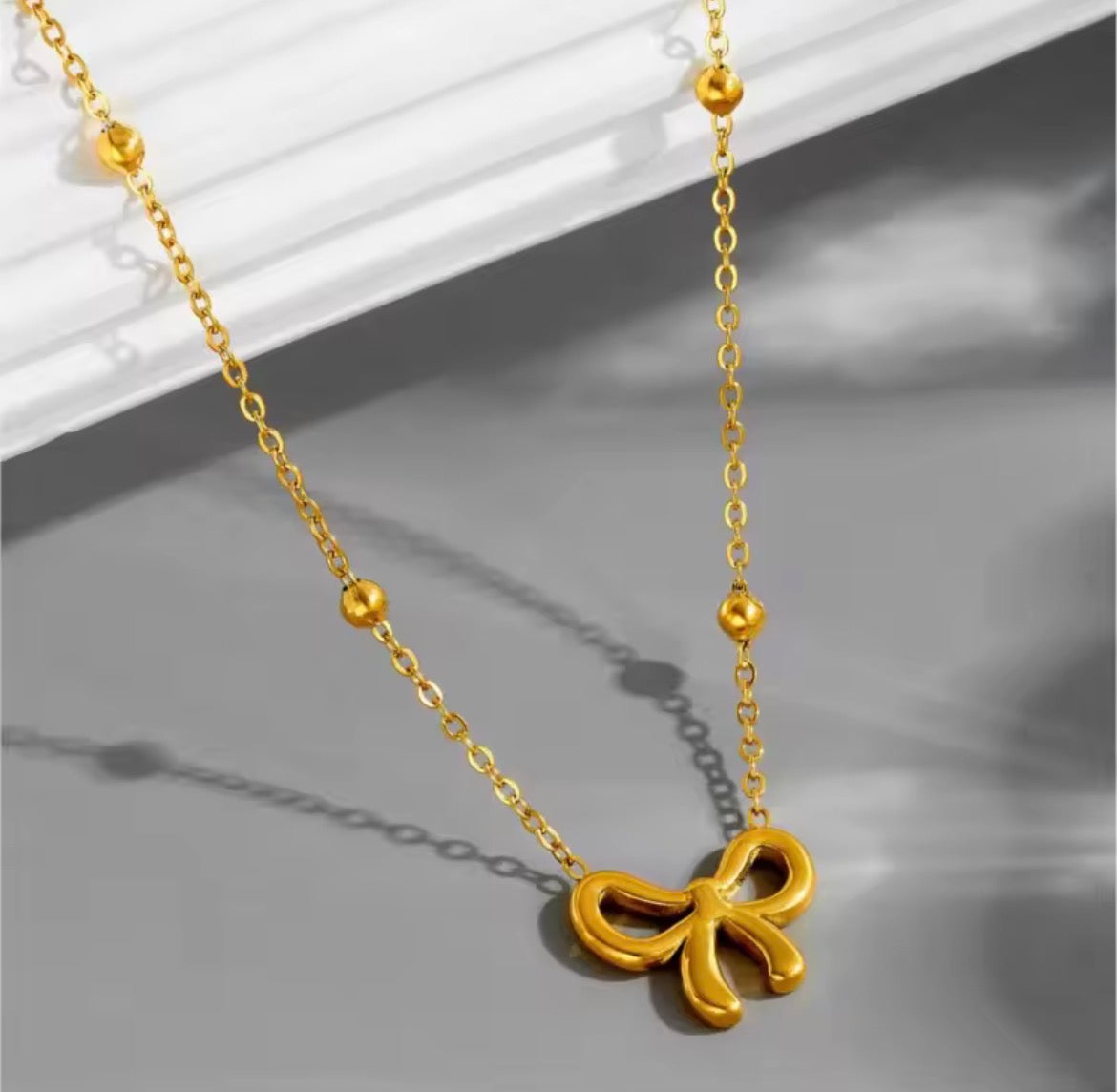 Adorned Bow Necklace